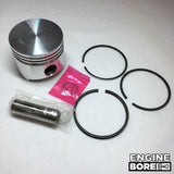 Kohler K301 K532 M12 Style A piston with rings installed for 3.375 inch bore, shows compression rings and oil control ring, 12HP engines